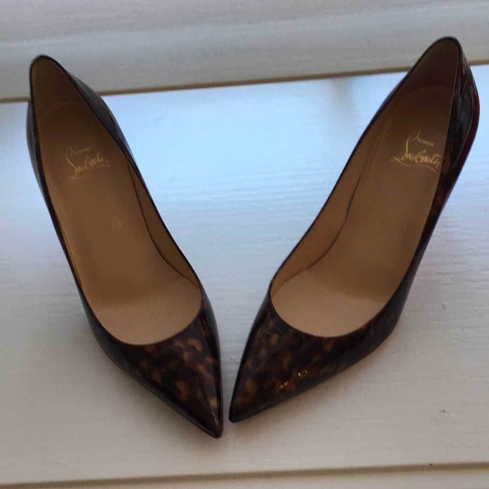 Christian Louboutin animal print pumps